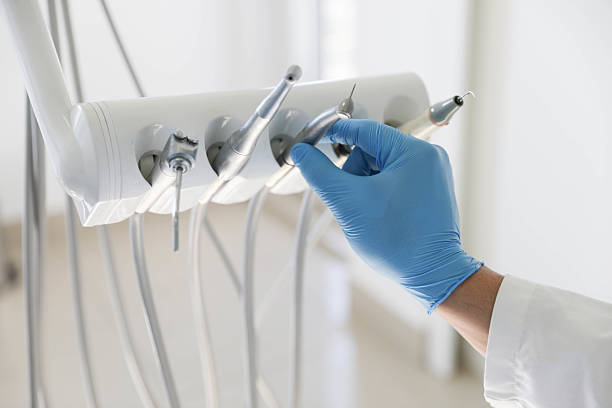 Professional Tooth Extraction technician working in Franklin Park, FL
